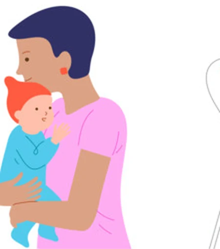 A caregiver holds their baby close after a moment of play.