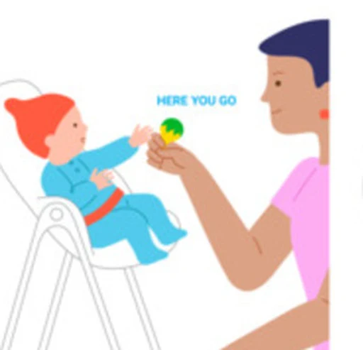 A caregiver offers a bright, easy-to-hold toy for a baby to explore.