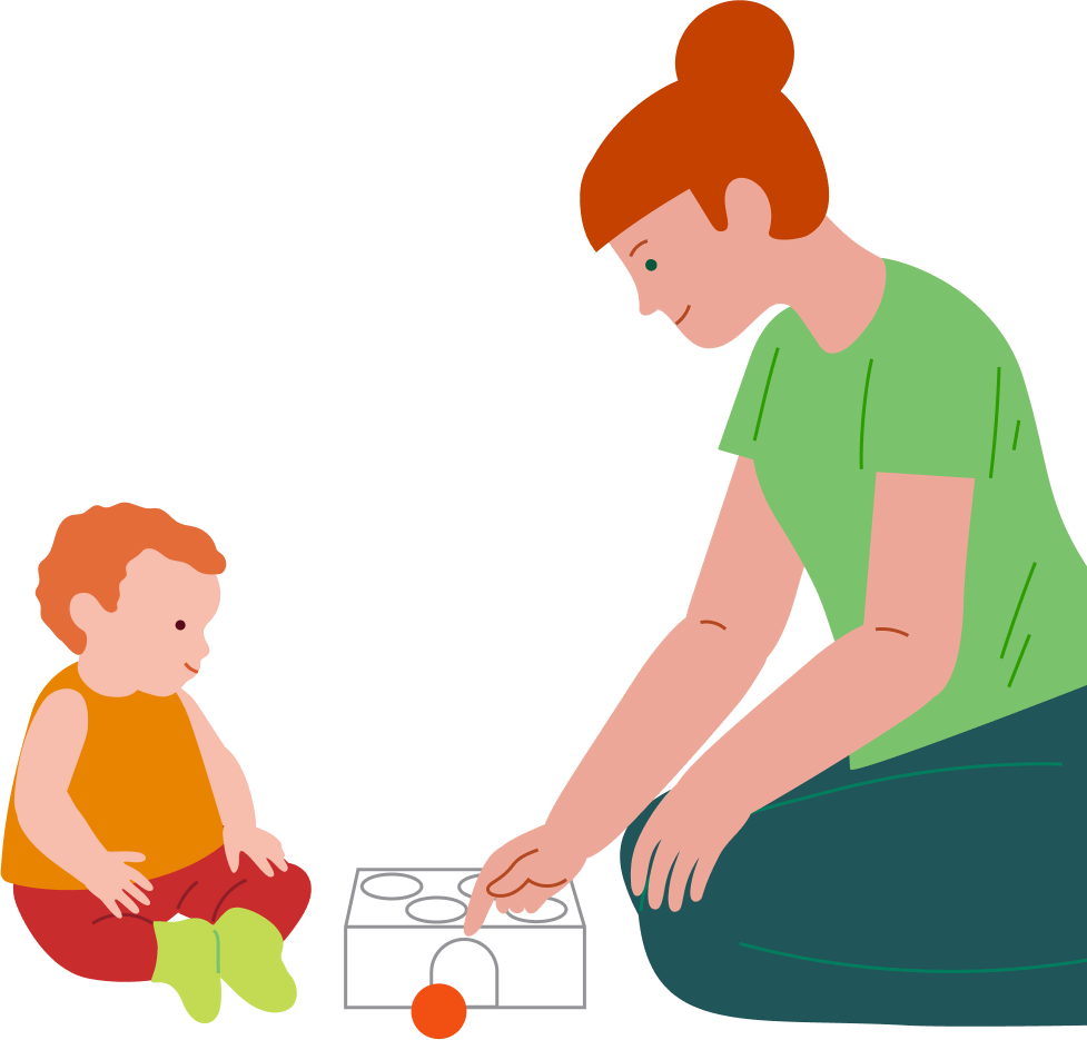 An adult demonstrates putting a ball into a shape-sorting box while a toddler watches.