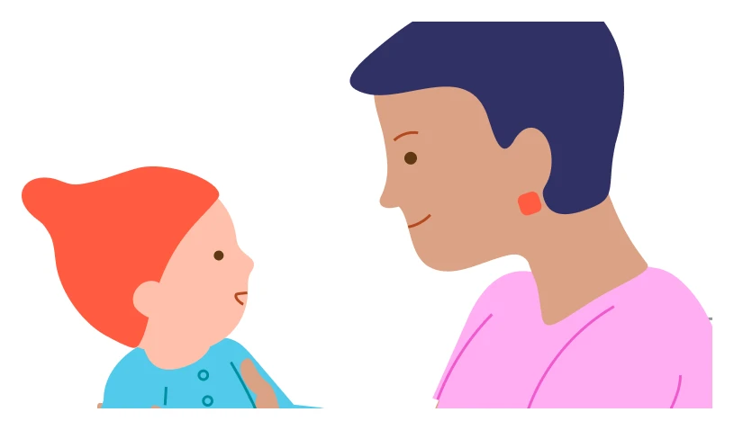A caregiver shares a face-to-face moment with a baby during play.