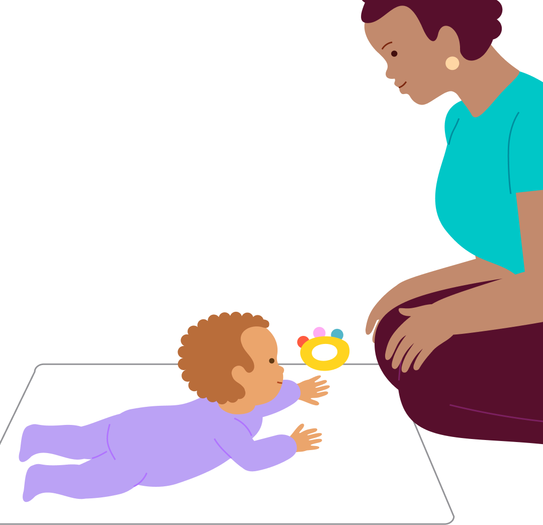Reach the rattle—crawling around in a circle on tummy, step 2