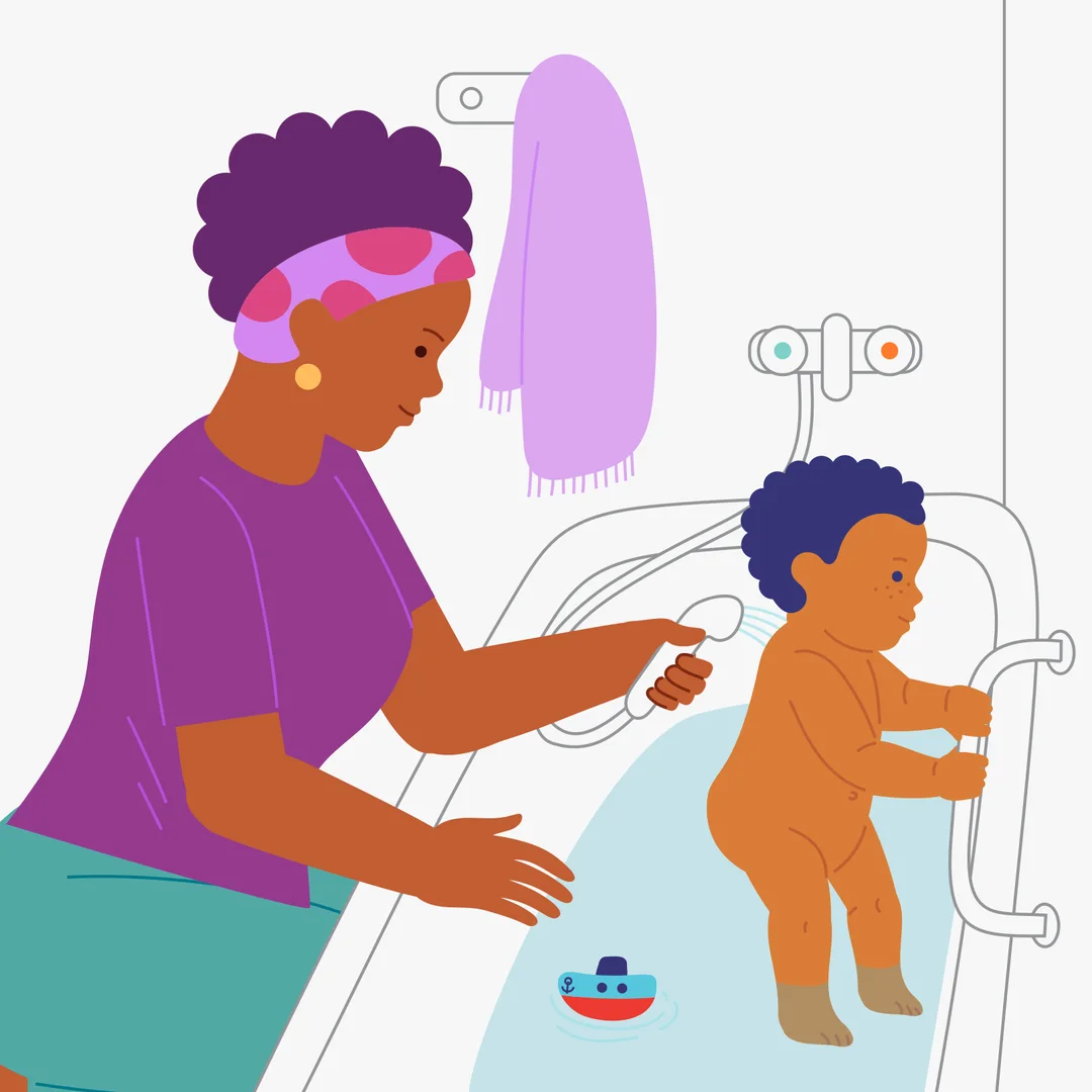 Illustration for “Bath Time”, step 3: Do not make bath time too long: “And now stand up on your feet — we are going to rinse off the soap!” Show your child the edge of the bath or a handrail on the wall if you have one: “Hold on here.” Use 